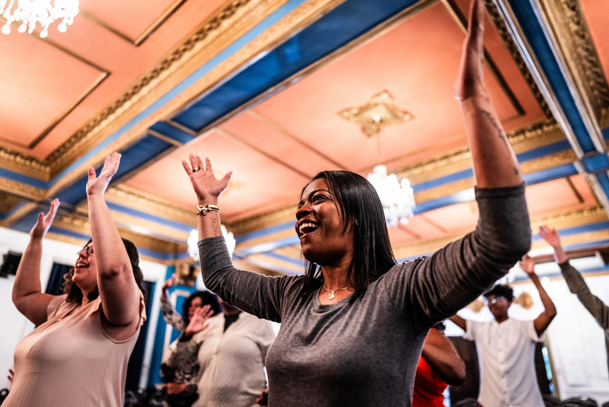 Woman worshipping during church service