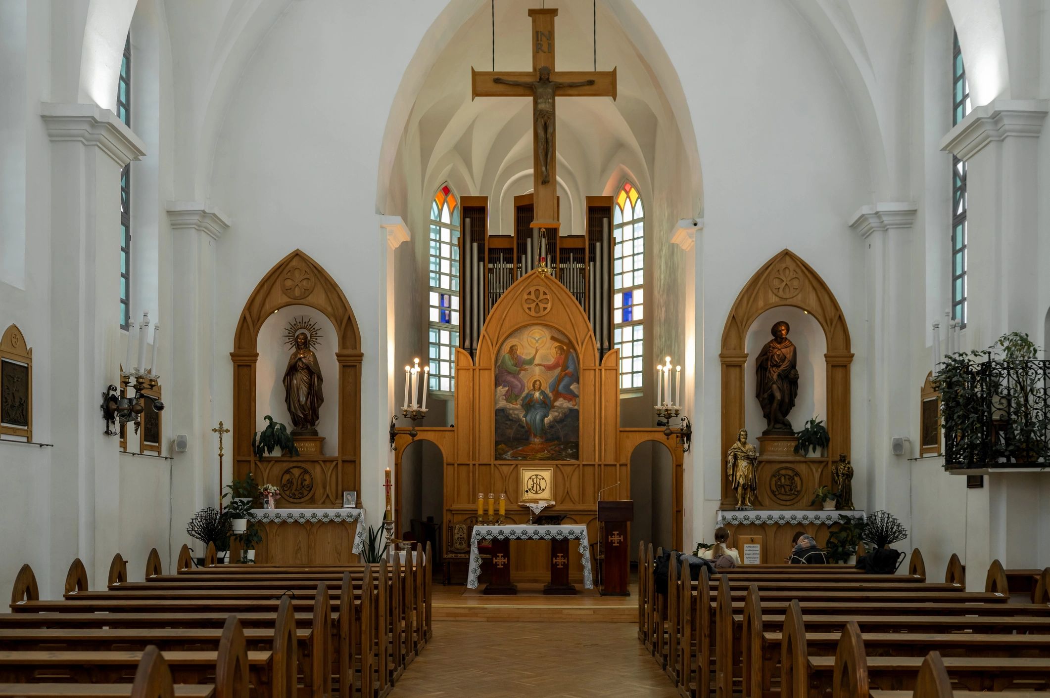 Interior of a Catholic church with pews and altar